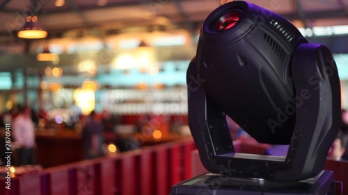 Wallpaper Mural Colour projector turning around in large bar with people Torontodigital.ca