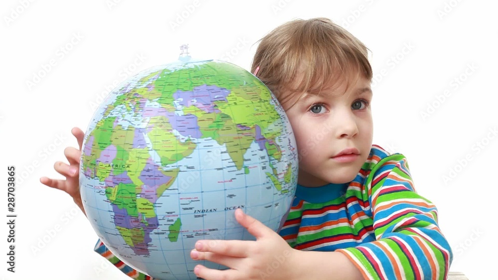 girl holds globe and taps on it with her fist girl holds globe and taps on it with her fist