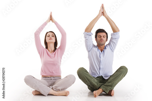 Couple practicing yoga