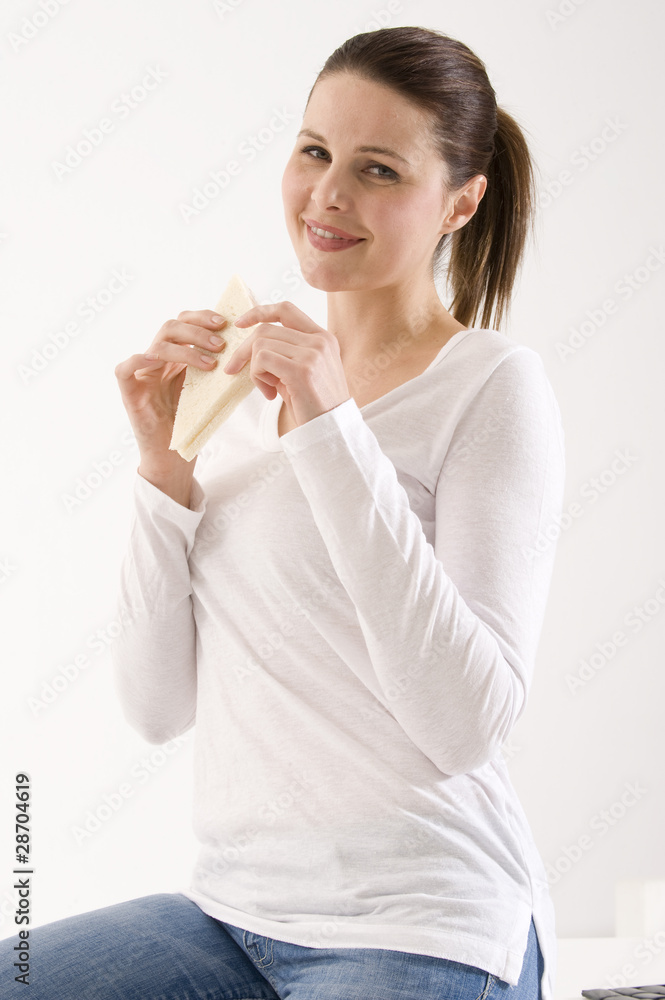 woman eating a sandwich