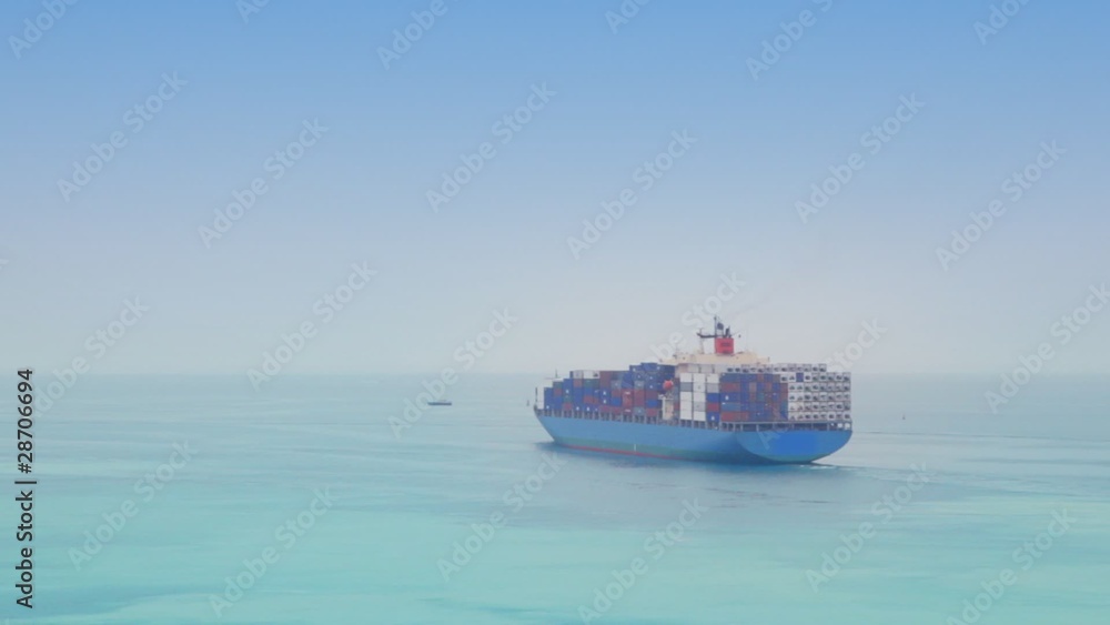 quite cargoship is very slowly going somewhere away quite cargoship is very slowly going somewhere away