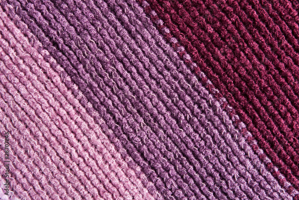 Warm and woolly, wintry striped knitting background Warm and woolly, wintry striped knitting background
