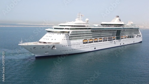 Wallpaper Mural cruise ship is slowly going away on sunny day Torontodigital.ca