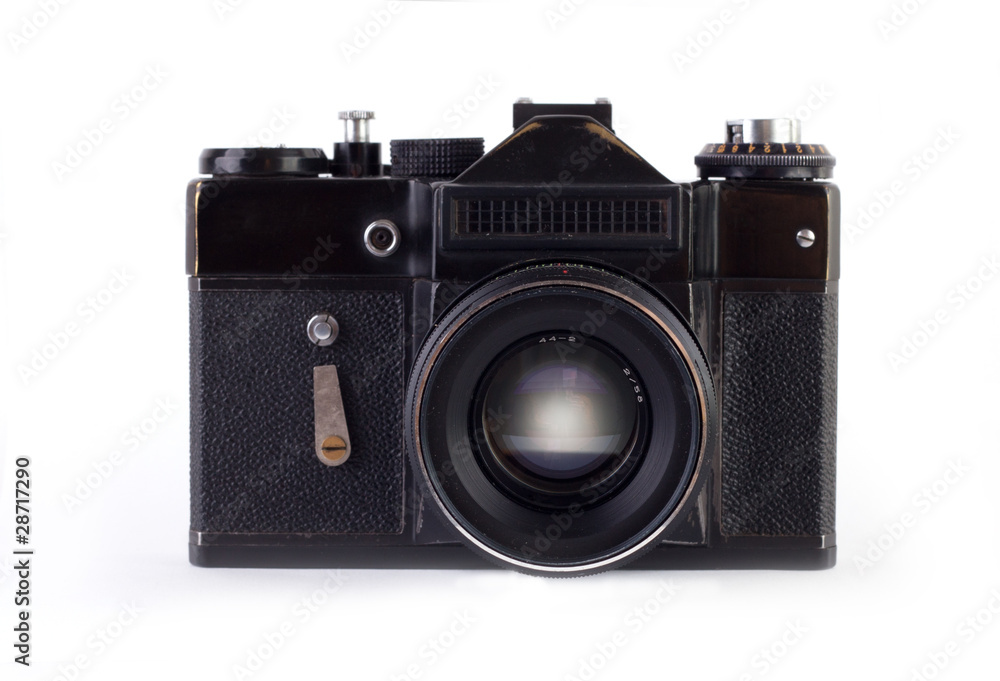 Old photo camera isolated on white background.