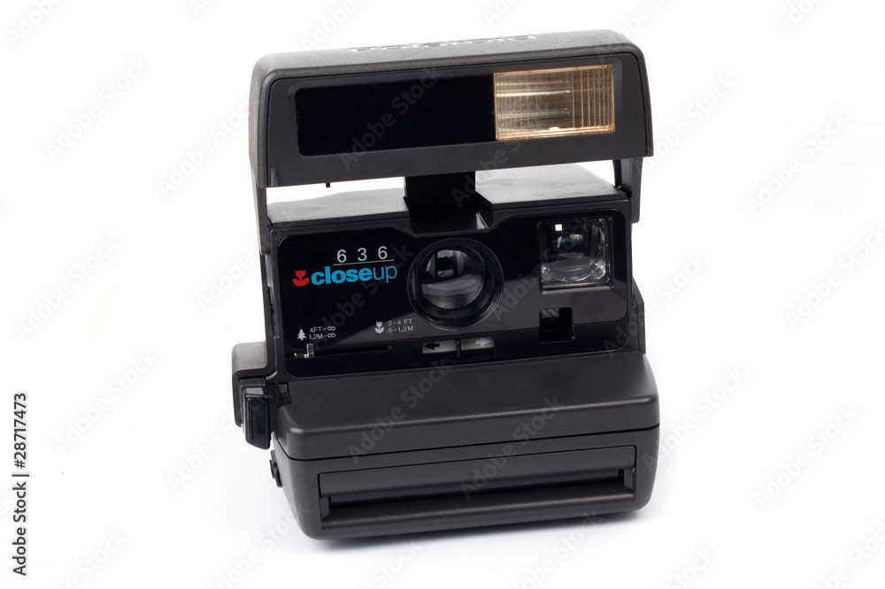 Polaroid, old camera isolated on white background. Polaroid, old camera isolated on white background.