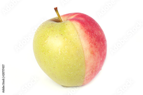 Ripe apple with water drops isolated on white background.