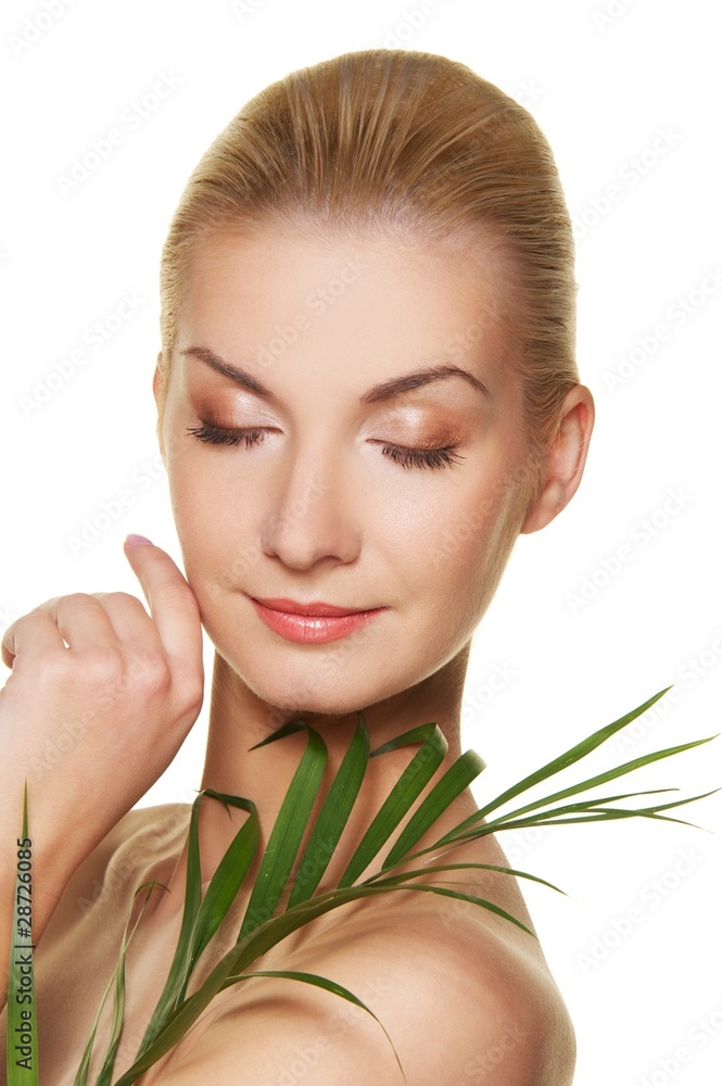 Beautiful woman with green plant Beautiful woman with green plant
