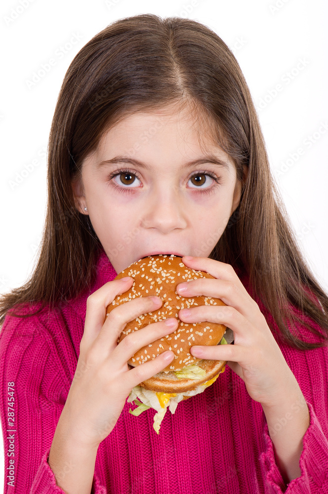 little girl eating hamburger- bambina con hamburger