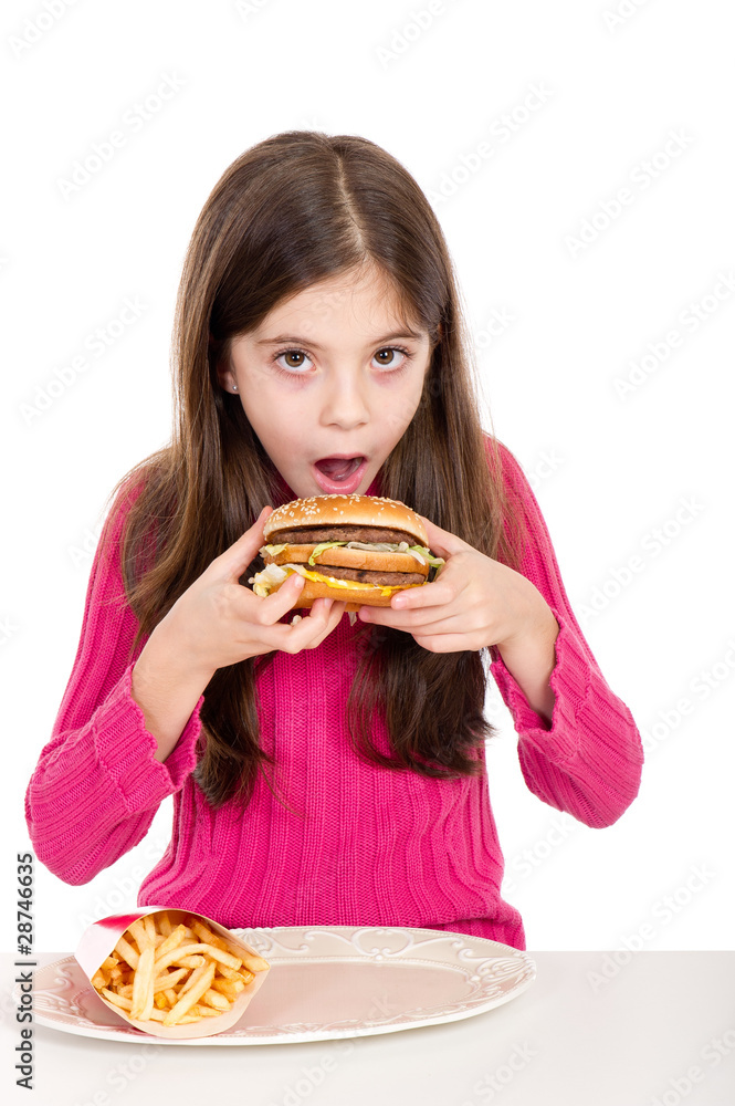 little girl eating hamburger- bambina con hamburger little girl eating hamburger- bambina con hamburger