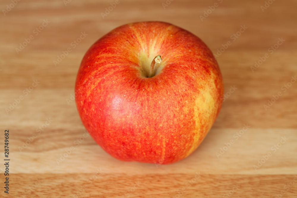Apple on rustic wood background Apple on rustic wood background