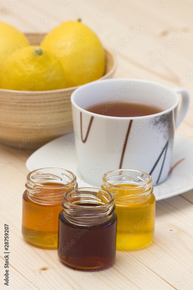 cup of tea, honey and fresh lemons cup of tea, honey and fresh lemons