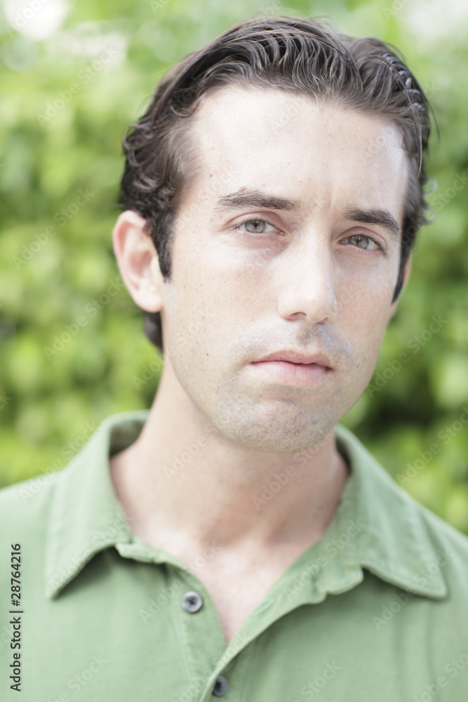 Headshot of a handsome man in a nature setting Headshot of a handsome man in a nature setting