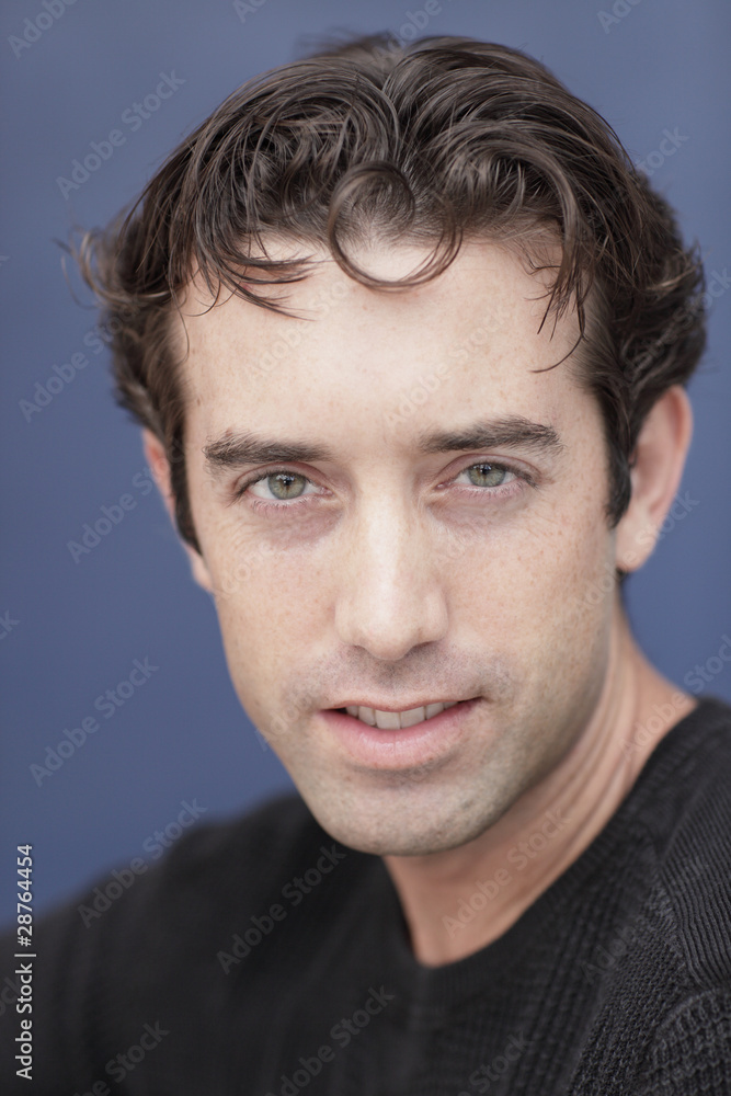 Fototapeta premium Handsome man on a blue background