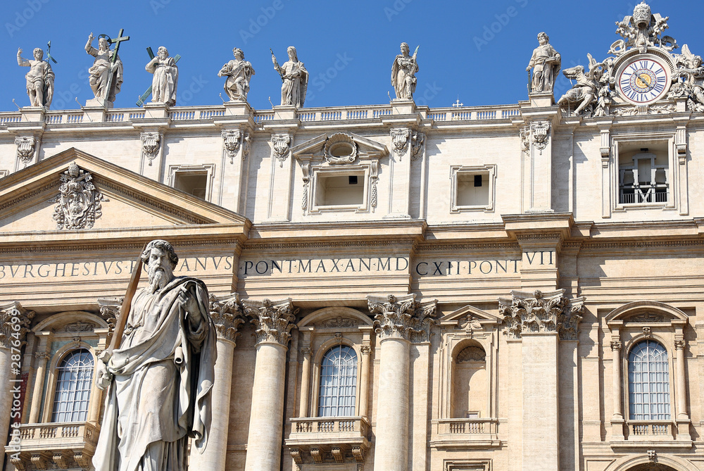 Statue with sword against St.Peter Basilica