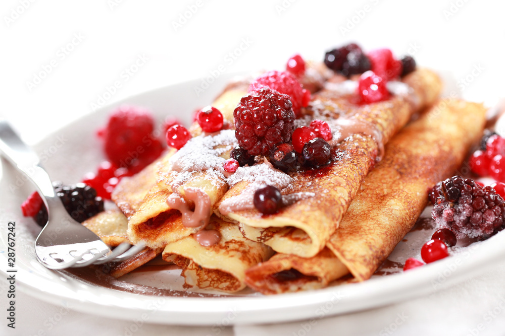 Crepes filled with chocolate and berries