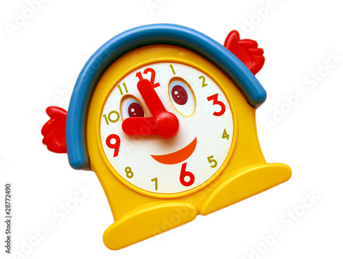 Smiling old toy clock