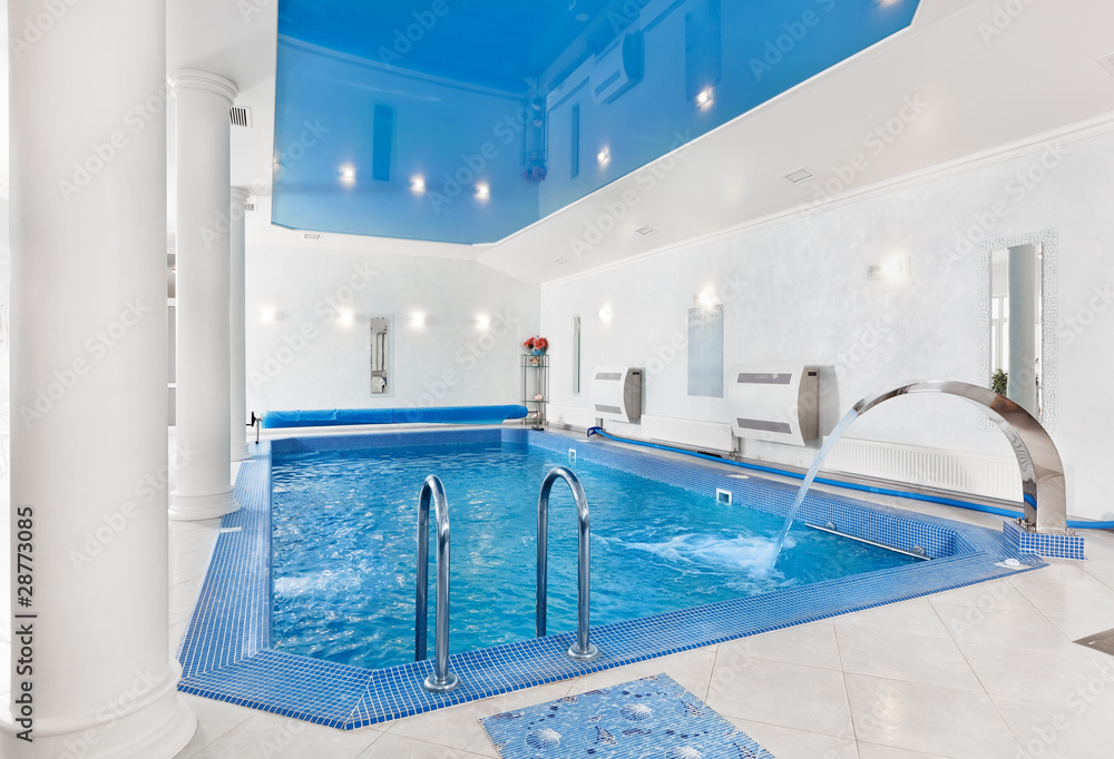 Indoor big blue swimming pool interior in modern minimalism styl Stock ...