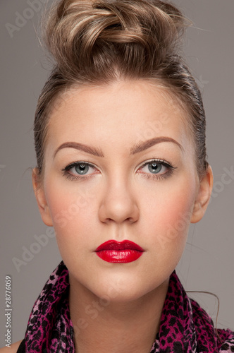 Closeup portrait of young rock girl. Red lips