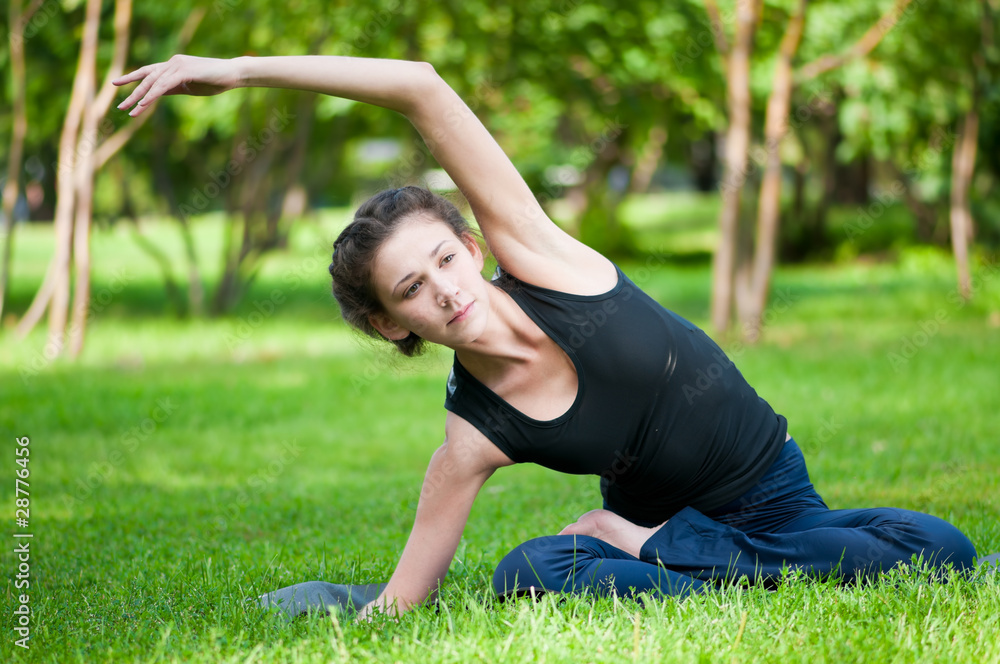 woman doing stretching exercise. Yoga