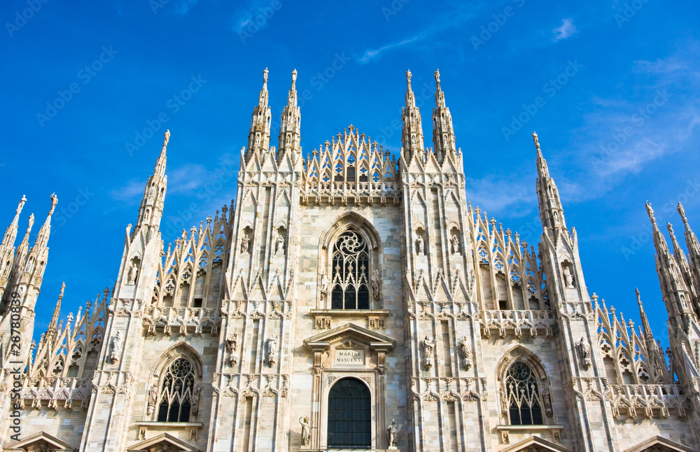 Milan cathedral dome against blue sky