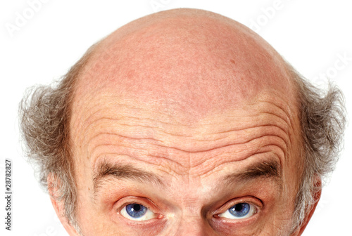 man looking up to his bald head photo