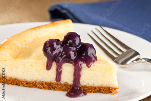 Slika na platnu Fresh home made cheesecake with blueberry topping
