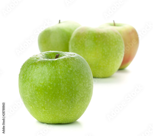 Four ripe green apples