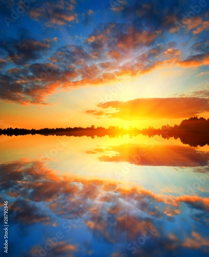 majestic sunset on a lake © Yuriy Kulik