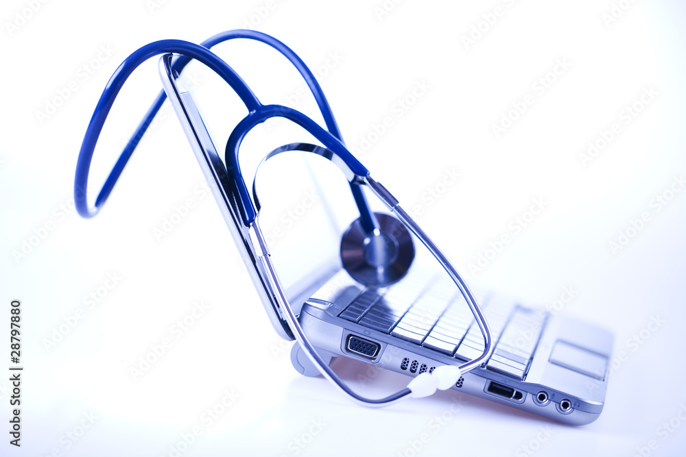 Laptop, notebook and Stethoscope Laptop, notebook and Stethoscope