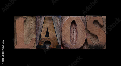 the word Laos in old letterpress wood type