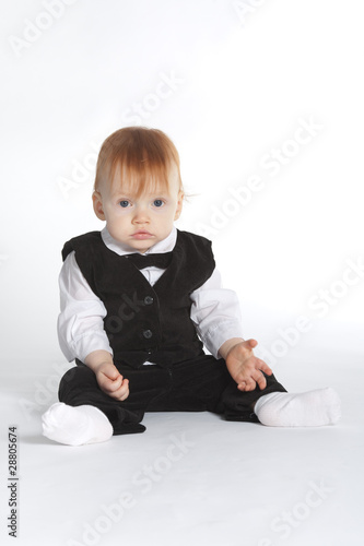 funny boy in suit with bow