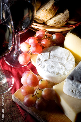 Red dry wine and cheese, still life
