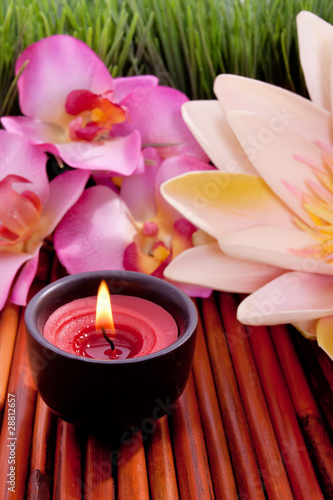 Spa candle and flower for aromatherapy