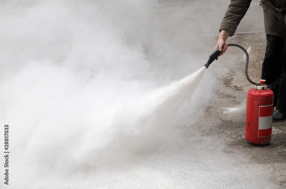 Fototapeta premium Fire fighting, activated extinguisher