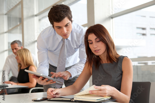 Business people working in the office with agenda