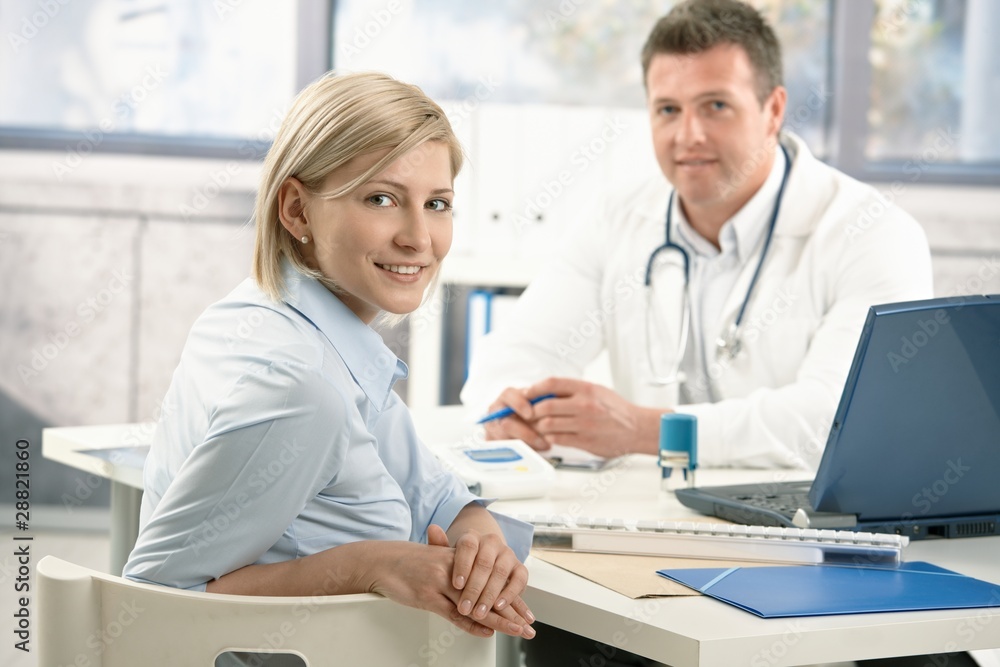 Smiling woman in doctor's office Smiling woman in doctor's office