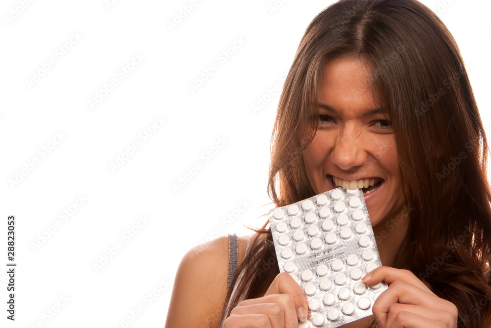 Pretty angry woman bites pack of tablets pills Pretty angry woman bites pack of tablets pills