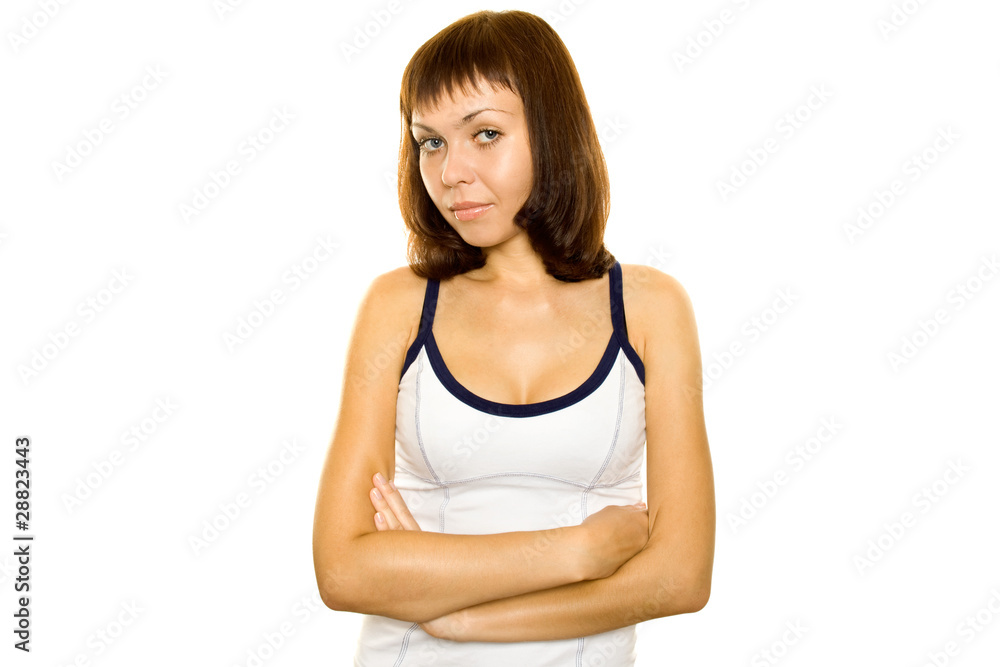 Young woman on white background. Сrossed hands Young woman on white background. Сrossed hands
