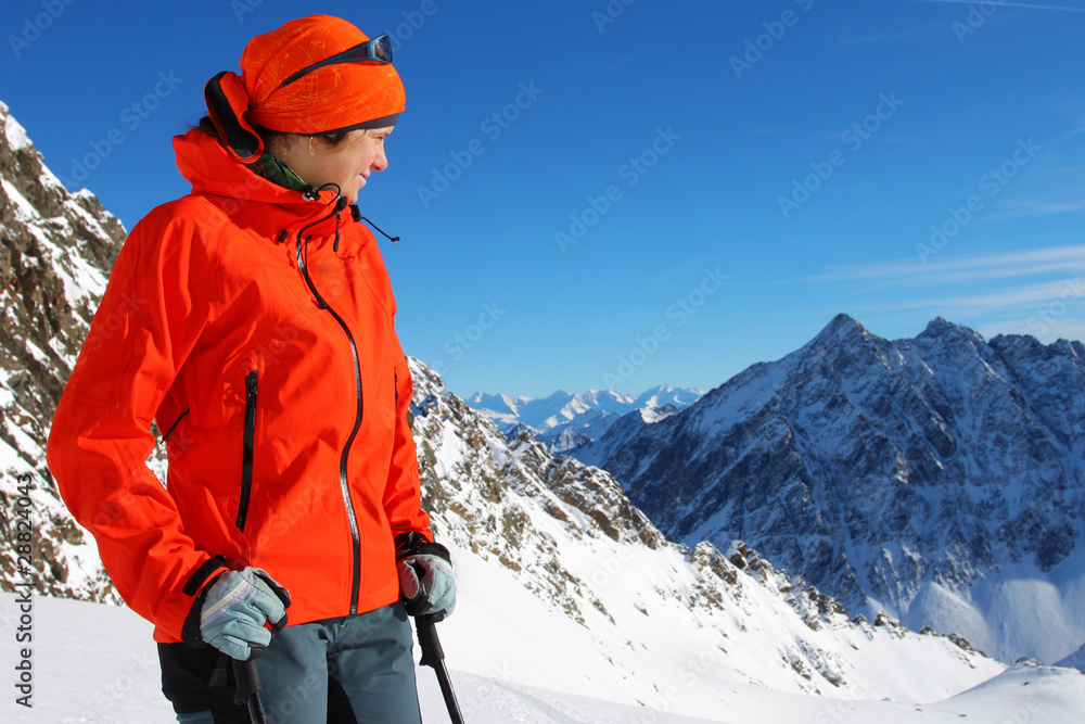 Portrait of young woman in winter mountains Portrait of young woman in winter mountains