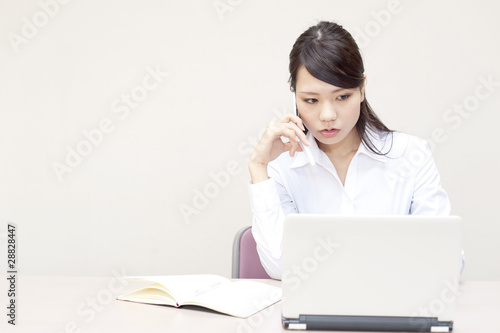 a portrait of young business woman working