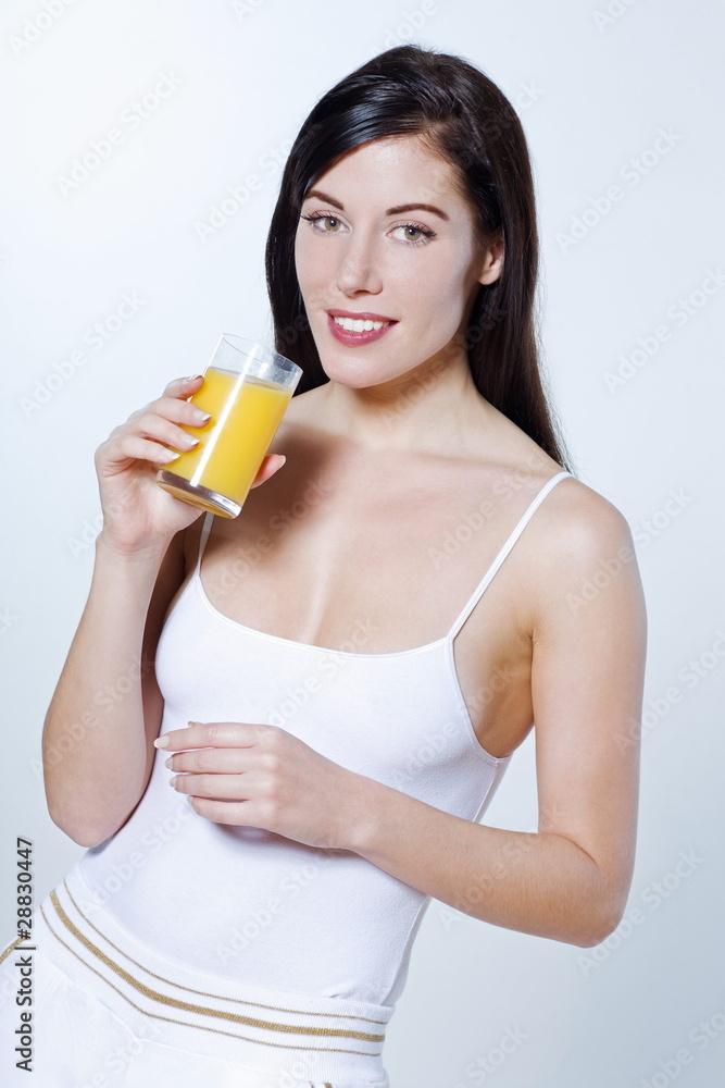 beautiful young woman drinking orange juice beautiful young woman drinking orange juice