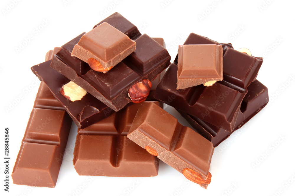 Fototapeta premium Many chocolate pieces on white background