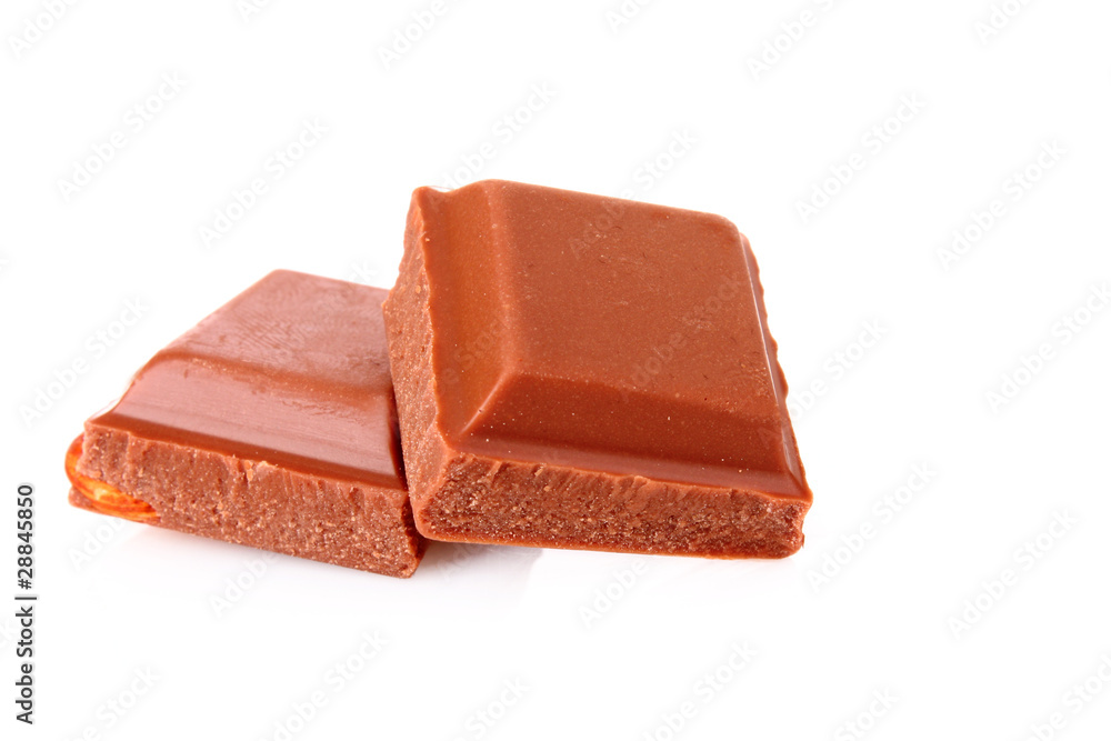 chocolate pieces on white background chocolate pieces on white background