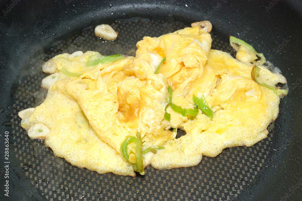 cooking egg omelet in the pan cooking egg omelet in the pan