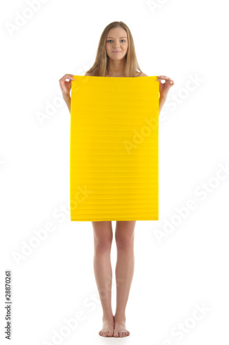 Young woman with yellow sheet of paper