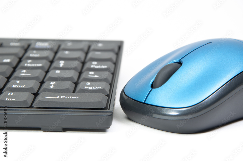 Close-up wireless computer keybaord and mouse Close-up wireless computer keybaord and mouse