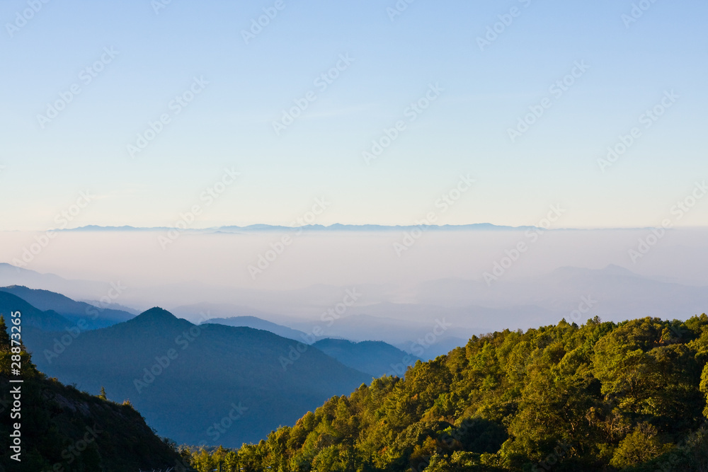 Fog on the mountain with green hills