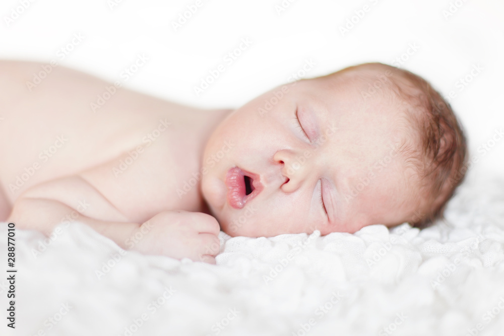 Newborn baby sleeping. Soft focus, shallow DoF. Newborn baby sleeping. Soft focus, shallow DoF.