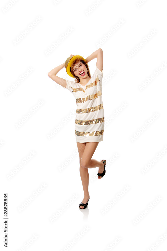 Naklejka premium Young dancer with gold hat