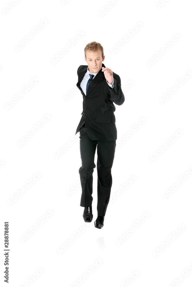 Attractive athletic businessman running Attractive athletic businessman running